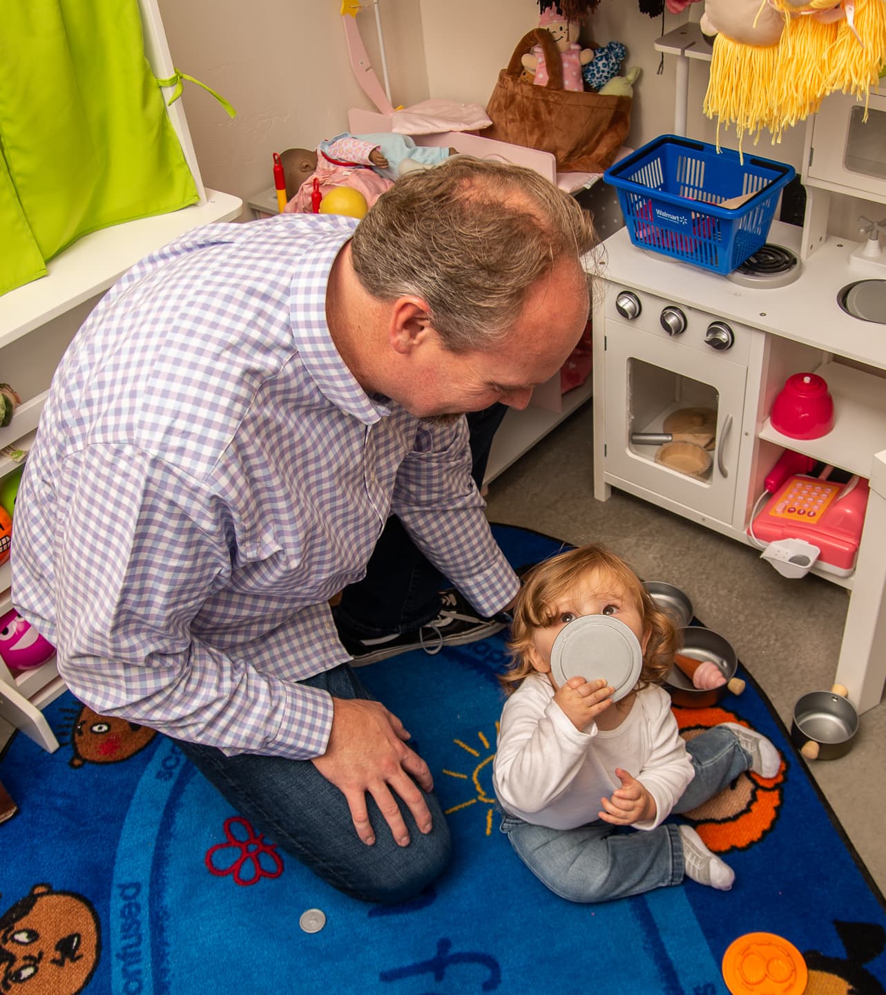 Jason Cheney working with a young child during play-based therapy